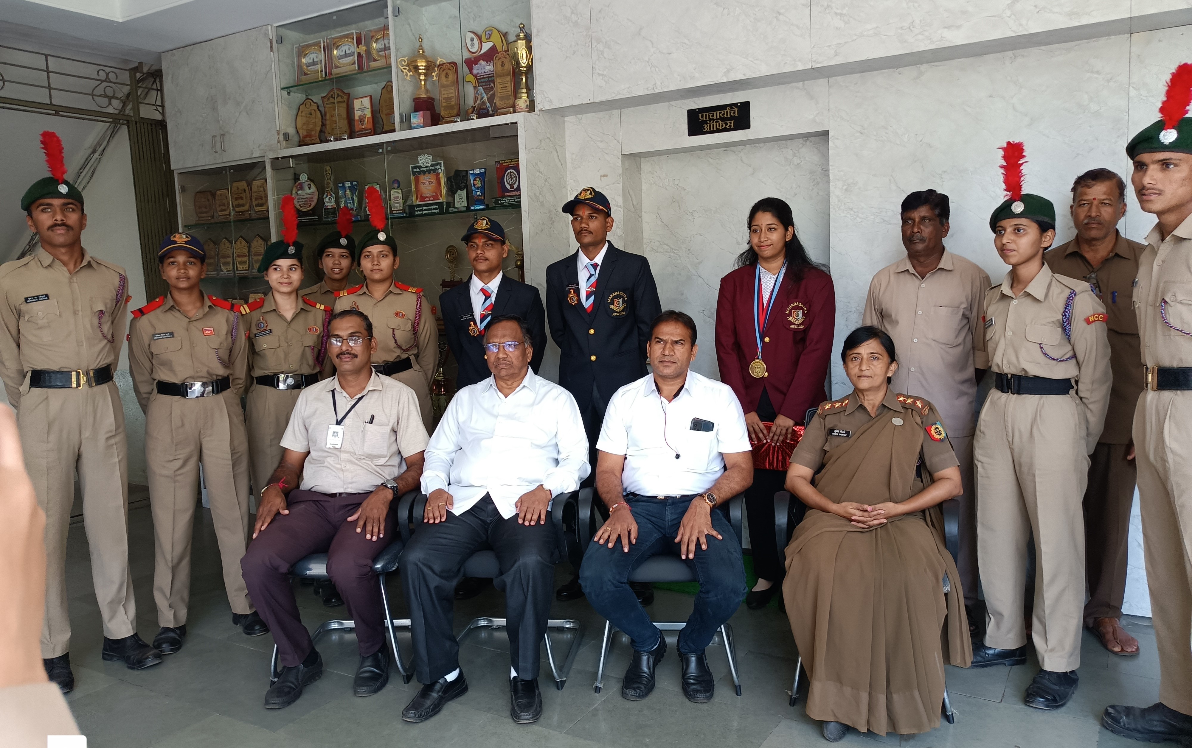 Three students felicitated for completing Thal Sainik Delhi Camp in Vivekanandaविवेकानंद महाविद्यालयातील एनसीसी विभागातील खालील तीन छात्रांची दिल्ली येथील थल सैनिक कॅम्पसाठी निवड झाली होती. यामध्ये ज्युनिअर अंडर ऑफिसर  सेला रेगे, बी.एस्सी.बायोटेक भाग 3  हिने हेल्थ ॲण्ड हायजिन व टेंट पिचिंग या इव्हेंटमध्ये सहभागी झाली होती. सेला रेगे हिला टेंट पिचिंग या इव्हेंटमध्ये सुवर्णपदक मिळाले.  तसेच   सिनिअर अंडर ऑफिसर  चेतन पवार , बी.कॉम.भाग 3  व सार्जण्ट  सार्थक कुलकर्णी 12 वी आर्टस  याची फायरींग इव्हेंट साठी निवड झाली होती. वरील तीनही छात्र थल सैनिक कॅम्प्‍ दिल्ली यशस्वीरित्या पूर्ण करुन परत आले. याबद्दल त्यांचा महाविद्यालयाचे प्राचार्य डॉ. आर. आर. कुंभार यांच्या हस्ते सत्कार करण्यात आला.  या यशाबद्दल श्री स्वामी विवेकानंद शिक्षण संस्थेचे कार्याध्यक्ष प्राचार्य मा. अभयकुमार साळुंखे, सेक्रेटरी मा.प्राचार्या सौ शुभांगी गावडे, मुख्य कार्यकारी अधिकारी कौस्तुभ गावडे, विवेकानंद महाविद्यालयाचे प्राचार्य डॉ. आर. आर. कुंभार यांनी अभिनंदन केले.    वरील छात्रांना 5 महाराष्ट् बटालियनचे कर्नल मानस दीक्षित,