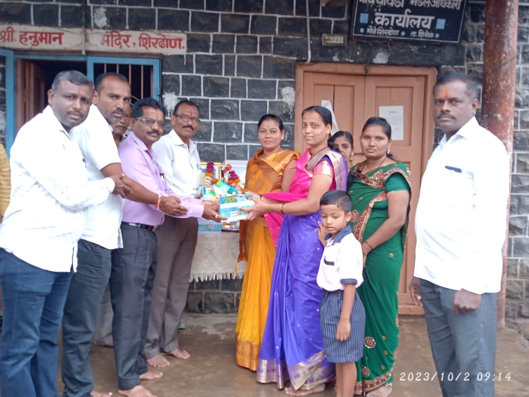 Distribution of booklets on the occasion of M  Gandhi Jayanti in Shirdhon