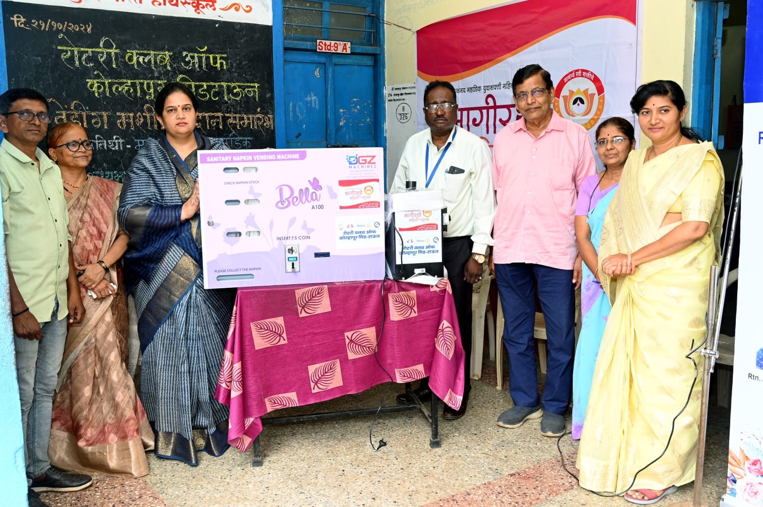 Distribution of sanitary napkin machine for girls by Bhagirathi Sanstha and Rotary Club of Kolhapur Midtown