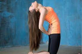 Do these yoga poses to prevent hair fall