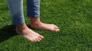 Benefits of walking barefoot on grass