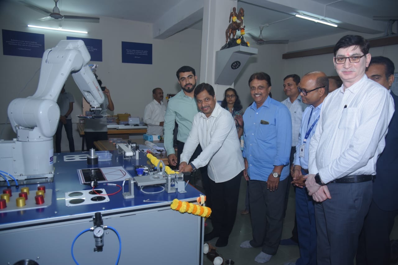 DY Patil in Engineering Six axis industrial robot in action