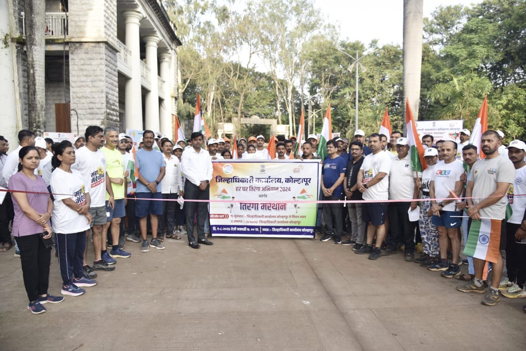 Collector Amol Yedge flagged off the start of the mini marathon